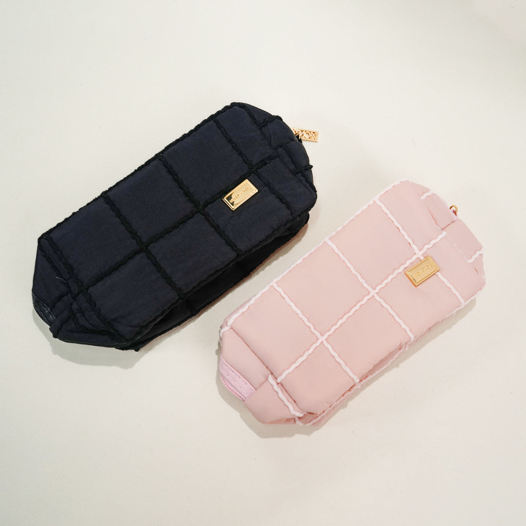 Cosmetiquera en tela exterior