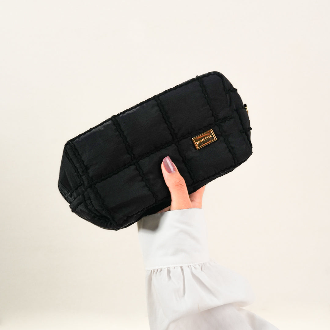 Cosmetiquera en tela exterior